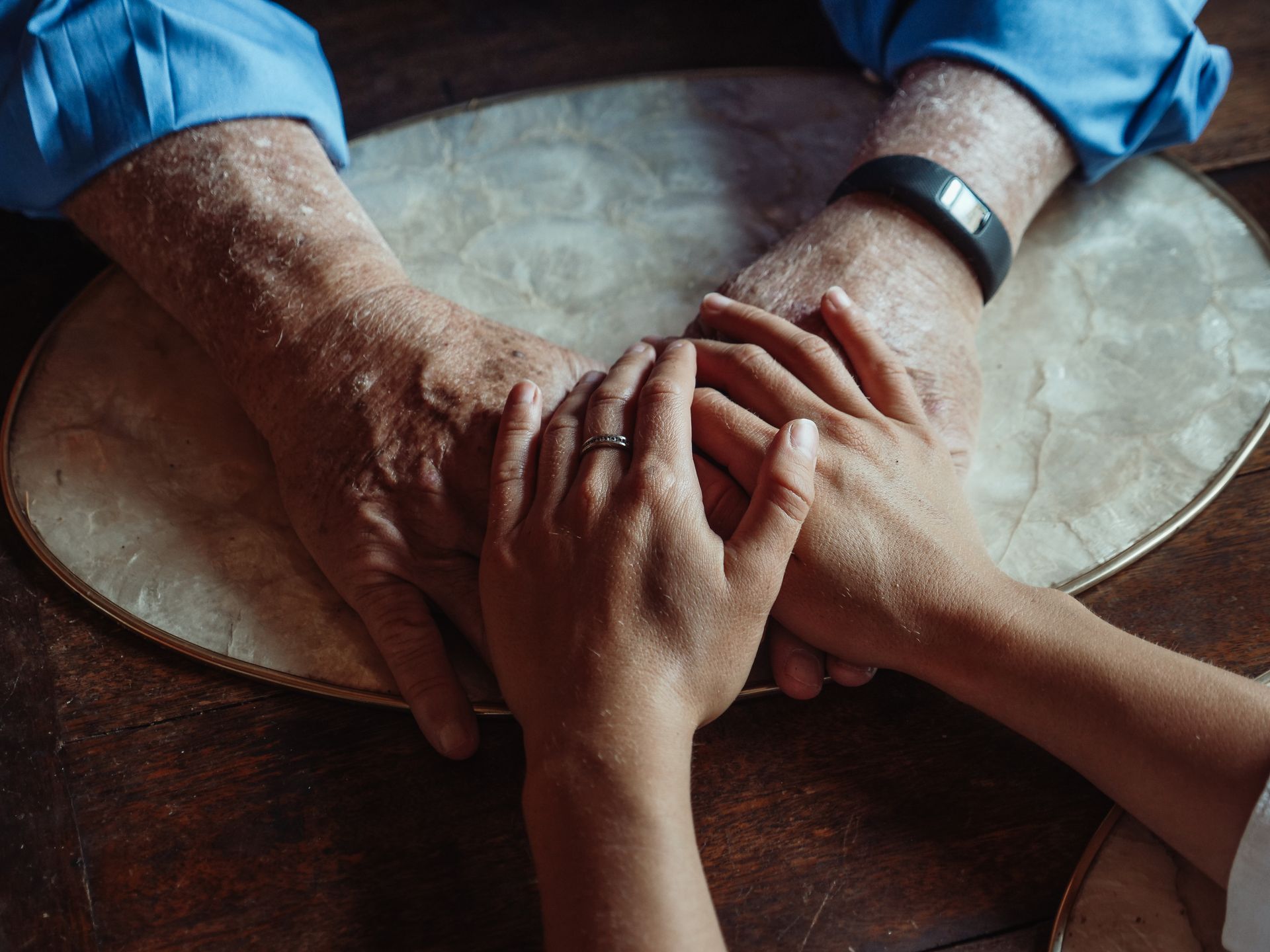 Hands joined in compassion